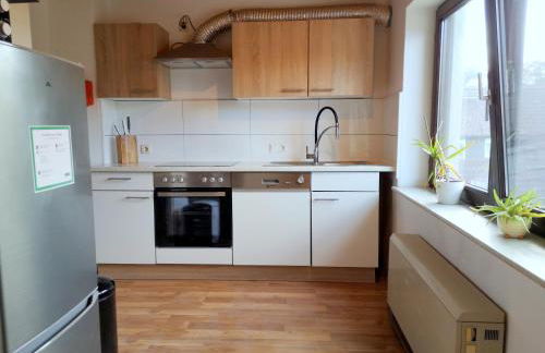 Family-Apartment mit Balkon, Küche, Parkplatz & Waschmaschine - Foto 16