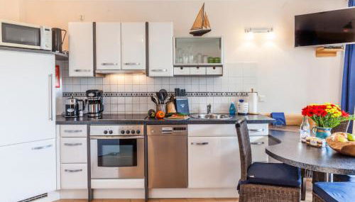 4 Sterne-Terrassen-Fewo "Heimathaven" direkt am Ostseestrand inkl Schwimmbad - Foto 4