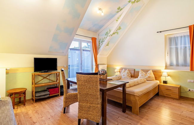 SCHUSTERjunge APARTHOTEL - Photo 12