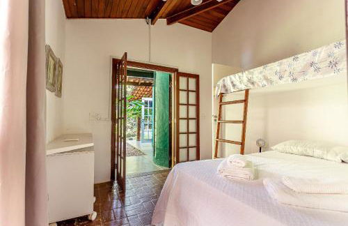 Casa dos Pássaros na areia a 20m da Praia da Baleia com 3 suítes e 1 dorm com ar condicionado, wifi, smart tv, cozinha completa e churrasqueira - Foto 26