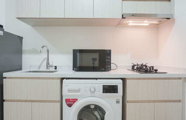 Comfy 1BR Sedayu City Suites Apartment - Photo 16