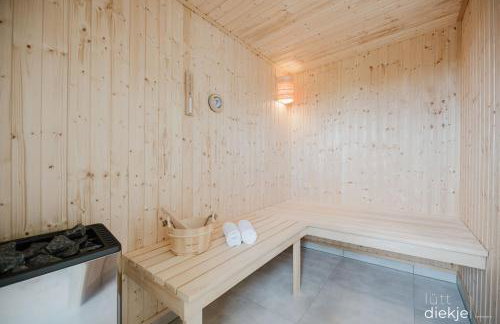 Lütt Diekje - Luxus-Haus mit Meerblick, Sauna & Kamin - Photo 4
