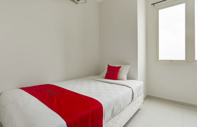 RedDoorz Apartment near Grand City Mall - Foto 9