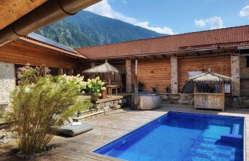 stylische Alpenlounge mit Pool, Blockhaus-Sauna und Jacuzzi für bis zu 12 Personen - Foto 50