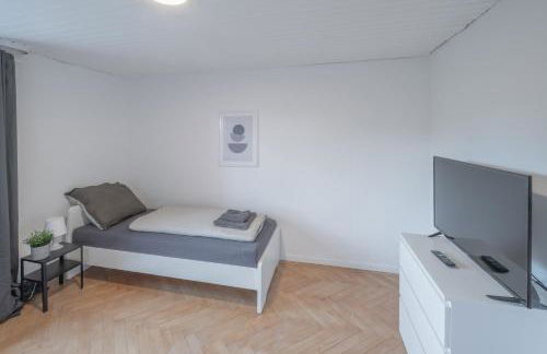 WORK&SLEEP - moderne Apartments mit Einzelbetten, TV, WLAN, Bettwäsche und Handtücher - Foto 6