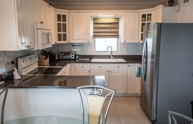 Enjoy Sunsets at Fully Equipped Condo at the Beach - Photo 9