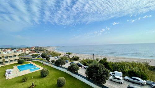 Condominio encantador, com piscina e vista mar - Ocean View Apartment - Photo 1, Garden, sunbed