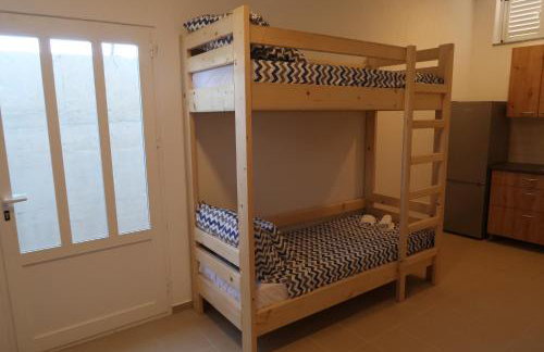 Robinson olive tree huts - Photo 39