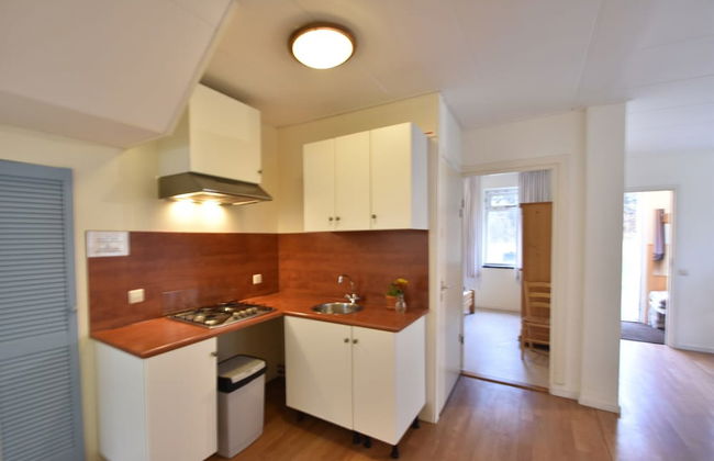 Timeless Charm and Cozy Stay - Photo 13