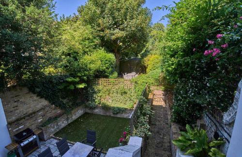 Bright Cozy Garden Retreat w Fast Wifi & 5min to Tube Subway Metro & Close to Park & Street Parking P4P - Foto 9