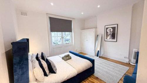Stylish 2-Bedroom Apartment in Maida Vale near Little Venice & Paddington by Staylio London - Foto 5, towels, wardrobe, heating
