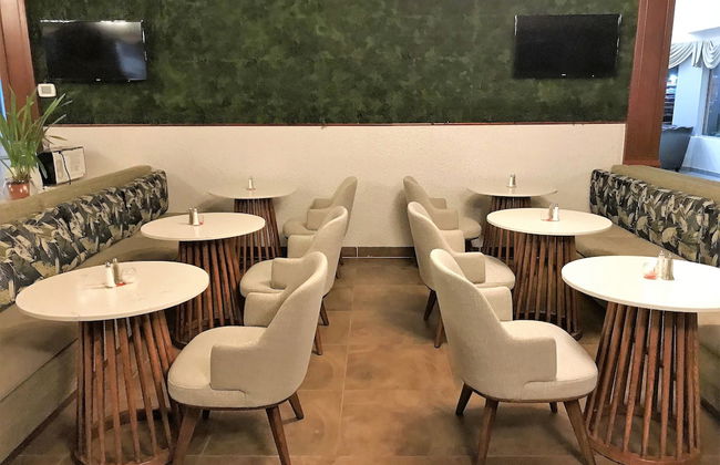 Medallion Inn & Suites - Foto 20