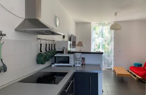 HOMEYPIC T3 en rez de jardin proche de Lyon - Foto 12