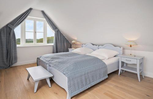 GUT KLETKAMP "Mühlenhof 5" - Ruhige Ferienwohnung mit 3 Schlafzimmern I Terrasse mit See- & Naturblick I Gemeinschaftsgarten I 15 Min zur Ostsee I Küche I Parkplatz I Waschmaschine I WLAN - Foto 8