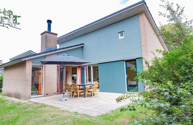 Restyled Holiday Home with Fireplace near Beach - Photo 1