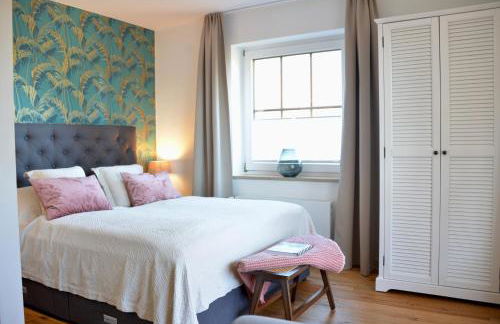 HAPPY PLACE mit Sonnen-Balkon und Stellplatz nur 400 m zum Strand - Foto 9