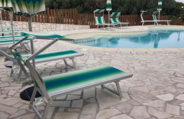 agriturismo gli olivastri -appartamento bel vedere con piscina ,solarium e vista mare,climatizzatore ,wifi - Photo 1