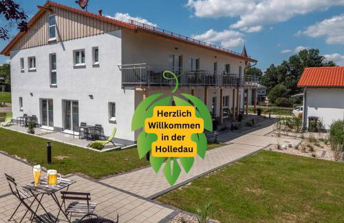 Holledau-Apartments - FeWo bis 5 Pers - getrennte Betten möglich - Vollausstattung - 24h Checkin - wöchentl Reinigung u Wäschewechsel - Waschmaschine u Trockner - WLAN - Minibar - XXL Parkplätze - Garten - ruhige Lage - Foto 1