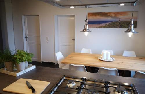 Liebevoll hinterm Deich - Ferienwohnungen - Foto 11