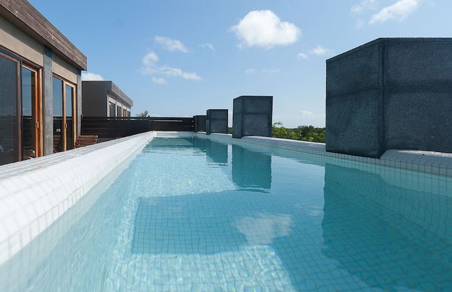Aparthotel in Tulum with swimming pool and garden - Photo 44