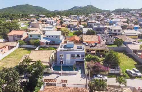 Refúgio Tropical Casa de Praia com Piscina e 4 Suítes e garagem 3 carros, 800 mtrs da praia internet 700 mbps, condomínio privado com pista de skate , quadra de futevôlei , campos e quadras de futebol! - Foto 49