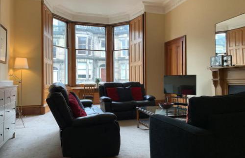 JOIVY Adorable 1 Bed Flat Near West End - Photo 1