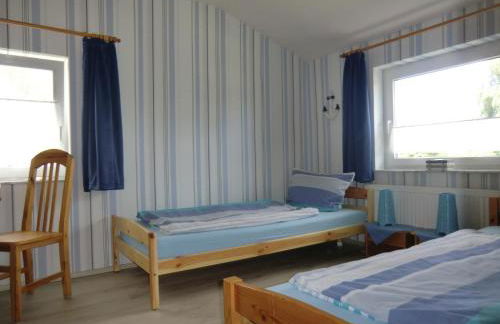 Böltser Hus Ferienwohnungen mit Strandkorb und Kamin 10 Gehminuten zum kurtaxefreien Sandstrand - Foto 49