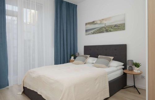 Stylish Apartment in Browary Warszawskie with Air Conditioning & Parking by Noclegi Renters - Foto 1