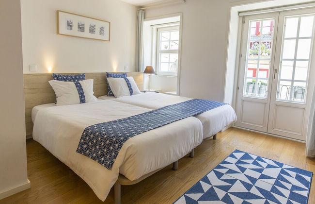 Bright 3BR Flat w/ AC in City Center by LovelyStay - Photo 23