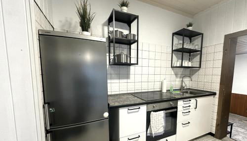 Großzügige Handwerkerwohnung - Viel Platz und voll ausgestattet - Photo 3, stove