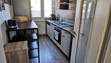 Moderne Ferienwohnung mit Seeblick und Balkon im EG - Foto 5, stove, dishwasher