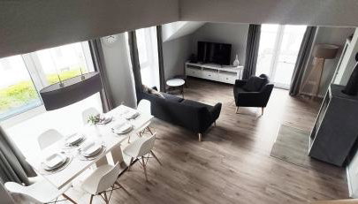 moderne Neubau-Wohnung mit Kamin und 35qm Dachterrasse - Foto 4