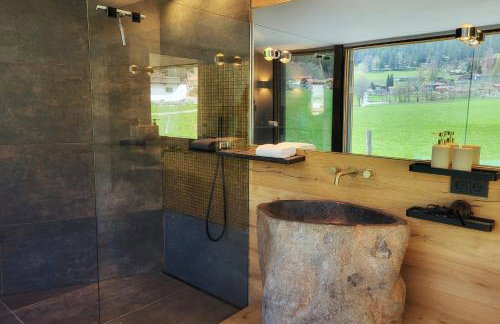 stylische Alpenlounge mit Pool, Blockhaus-Sauna und Jacuzzi für bis zu 12 Personen - Foto 38