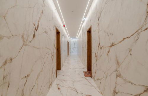 Sleek & Modern Flat w/ Private Garage by HostWise - Photo 29