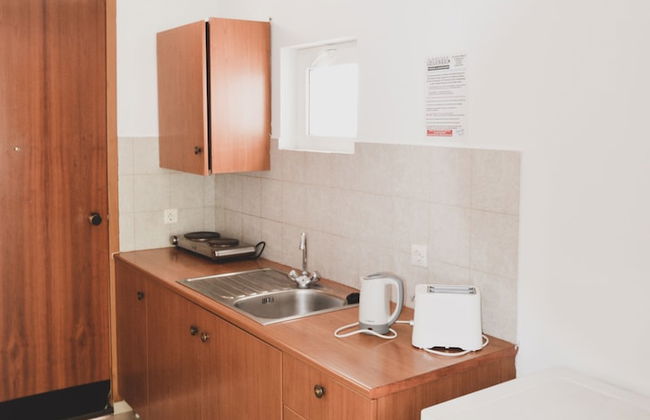 Coliseum Studios & Apartments - Foto 7