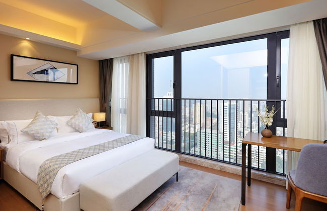 Yuwa Serviced ApartHotel - Photo 4