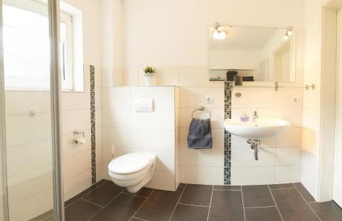 Ferienwohnung Waterkant direkt am Wittensee, mit Spielscheune - Photo 13