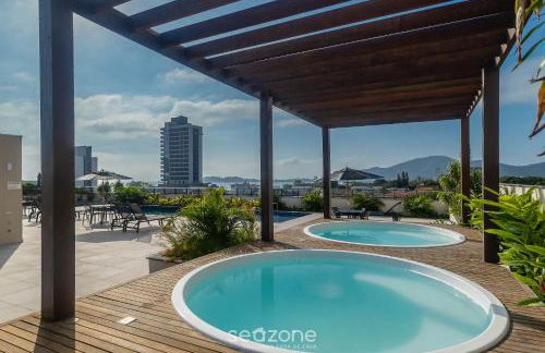 Estadia completa com piscina a 400m da Praia da Armação - SKL - Foto 7