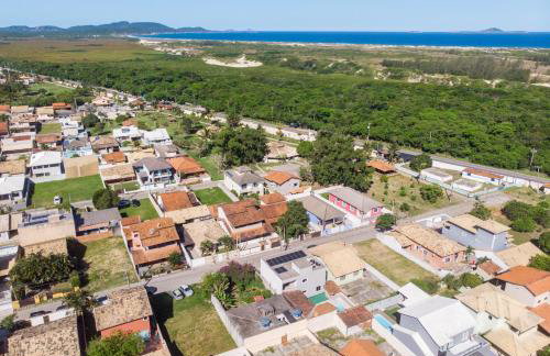 Refúgio Tropical Casa de Praia com Piscina e 4 Suítes e garagem 3 carros, 800 mtrs da praia internet 700 mbps, condomínio privado com pista de skate , quadra de futevôlei , campos e quadras de futebol! - Foto 47