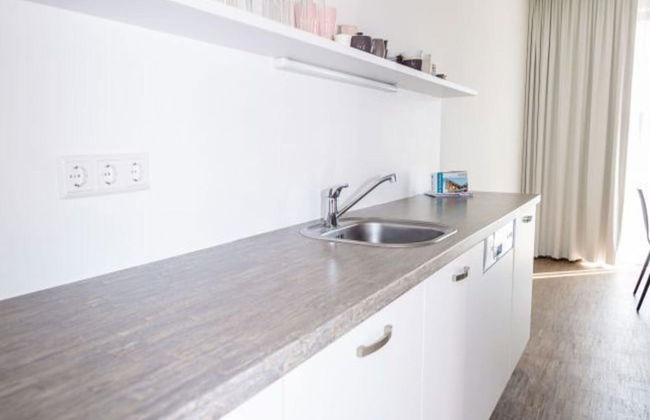 Lush Apartment With Private Sauna - Photo 7