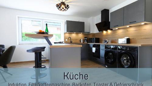 Ferienhaus Höckelheim- 300qm - 3 Wohnungen - 12 Zimmer - bis 18 Gäste - Kleinkinder reisen gratis - für Familien und Gruppen - Küchen mit Spülmaschine Backofen, Mikrowelle - Smart-TV - WLAN - Fußbodenheizung, Klimaanlage & Raffstores - nähe Göttingen - Foto 3, stove, dishwasher