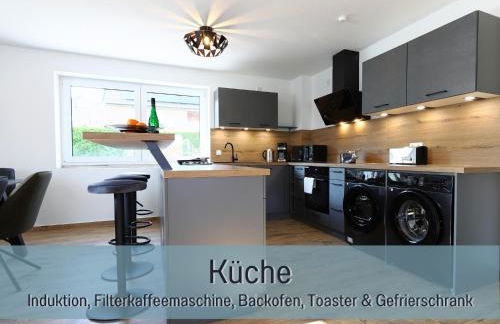 Ferienhaus Höckelheim - Savanna Lodge - barrierefrei - 3 Schlafzimmer-bis 6 Gäste - nahe Göttingen - 100 qm - Babies reisen gratis - Terrasse, Garten & Grill - vollausgestattete Küche mit Spülmaschine - Klimaanlage, Fußbodenheizung & Raffstores - Photo 26