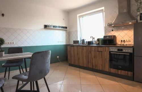 Familienwohnung mit Whirlpool Badewanne und Balkon - Foto 10