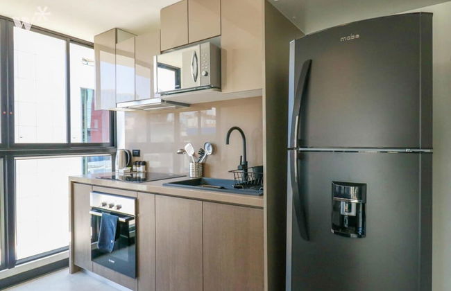 w Sleek 1BR in San Isidro - Photo 3