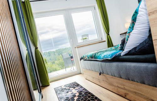 Stilvolle Ferienwohnung mit Blick in die Natur - Foto 13