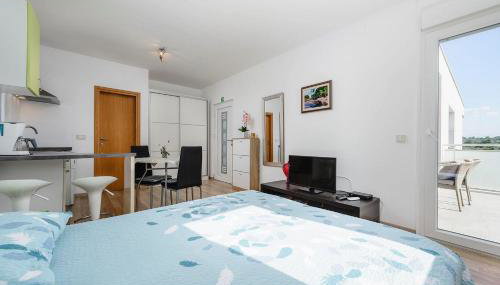 Lichtdurchflutetes Studio-Apartment nur 500 Meter zum Strand mit Grillbereich - Foto 5