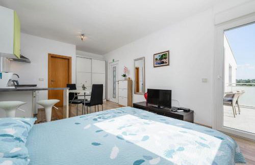 Lichtdurchflutetes Studio-Apartment nur 500 Meter zum Strand mit Grillbereich - Foto 5