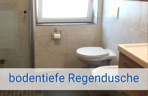 Böltser Hus Ferienwohnungen mit Strandkorb und Kamin 10 Gehminuten zum kurtaxefreien Sandstrand - Foto 7