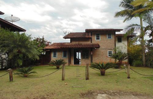 Casa rústica e charmosa em condomínio - Lagoinha - Foto 1