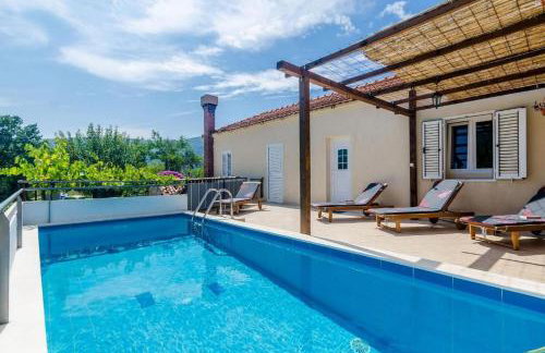 Tranquil Villa with Pool - Photo 1
